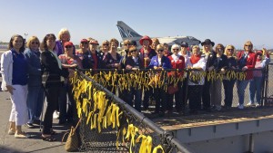 Daughters from District XIV joined District Director Jeanette Shiel and Celebrate America! State Chair Jennifer Smith in a ribbon tying ceremony on the flight deck of the USS Midway to honor the 58,220 Americans who lost their lives in the Vietnam War.